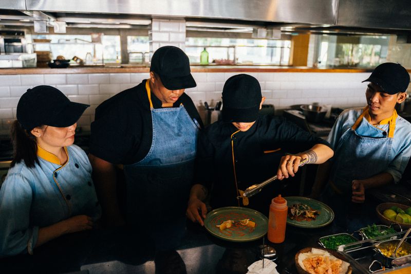 Team collaboration at Pizza inn kitchen